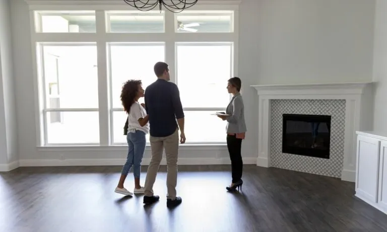 Real estate agent showing house Real estate agent showing house